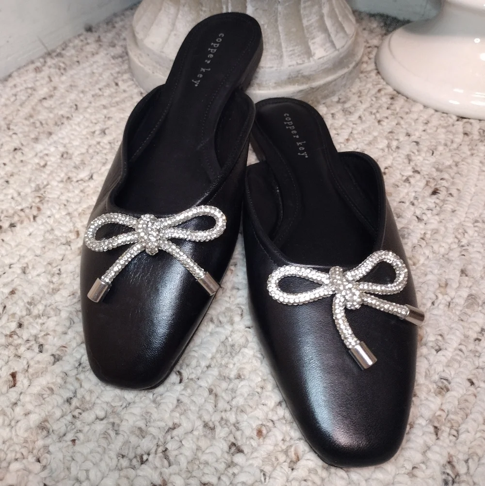 Copper Key Glimmer Black Leather Slip-On Mules with Rhinestone Bow Accent - Picture 2 of 8